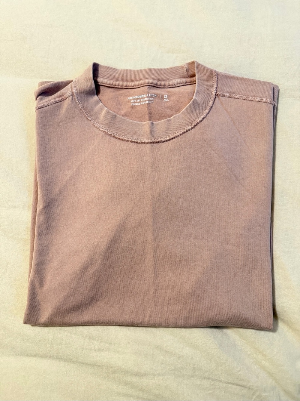Abercrombie & Fitch Distressed
Vintage-Inspired Tee in Dusty Pink